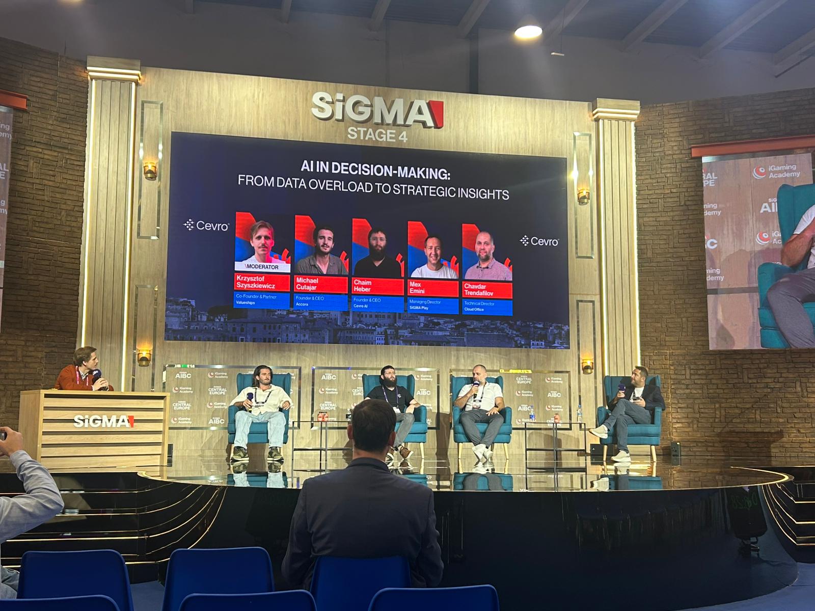 Michael Cutajar speaking at SiGMA Summit about AI in Decision-Making